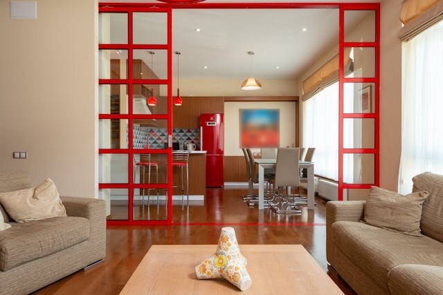 open%20concept%20living%20dining%20room%20with%20red%20accents